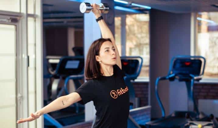 single-arm power snatch - full body dumbbell exercises for weight loss